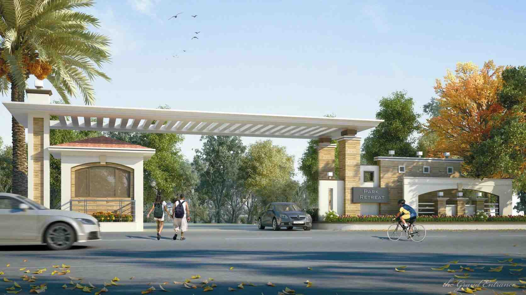 Photograph of the main entrance gate and driveway at Park Retreat villa community